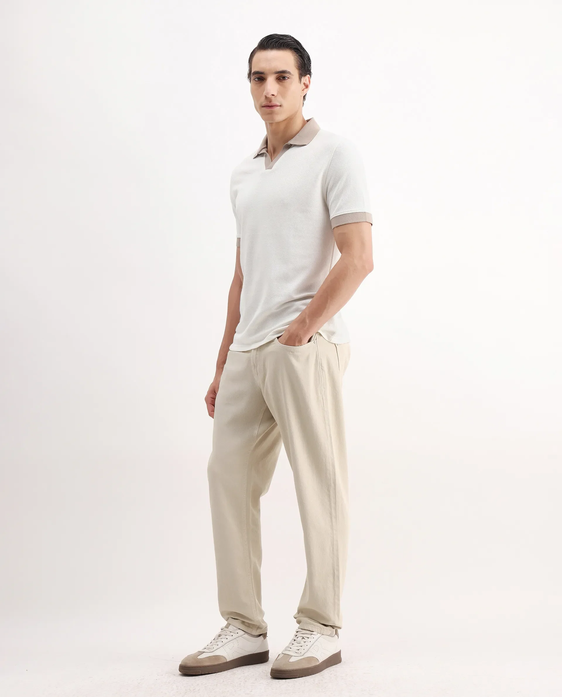 Rare Rabbit Men's Arvi-2 Light Beige Cotton Blend Plain Dond Carrot Fit Jeans - Image 5