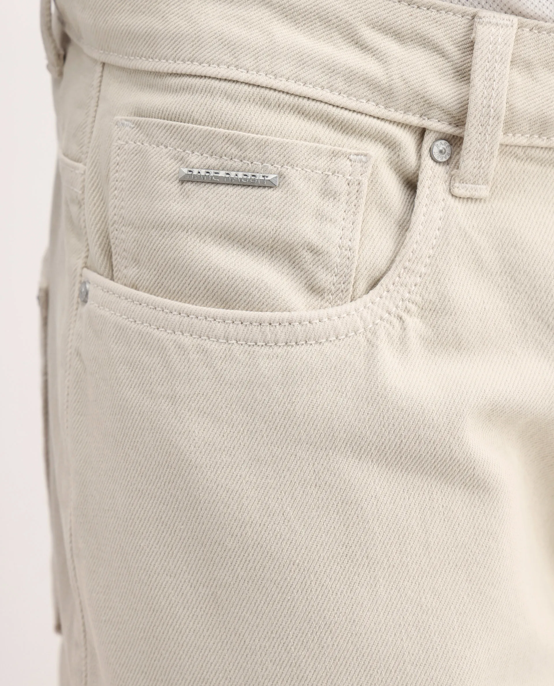 Rare Rabbit Men's Arvi-2 Light Beige Cotton Blend Plain Dond Carrot Fit Jeans - Image 8