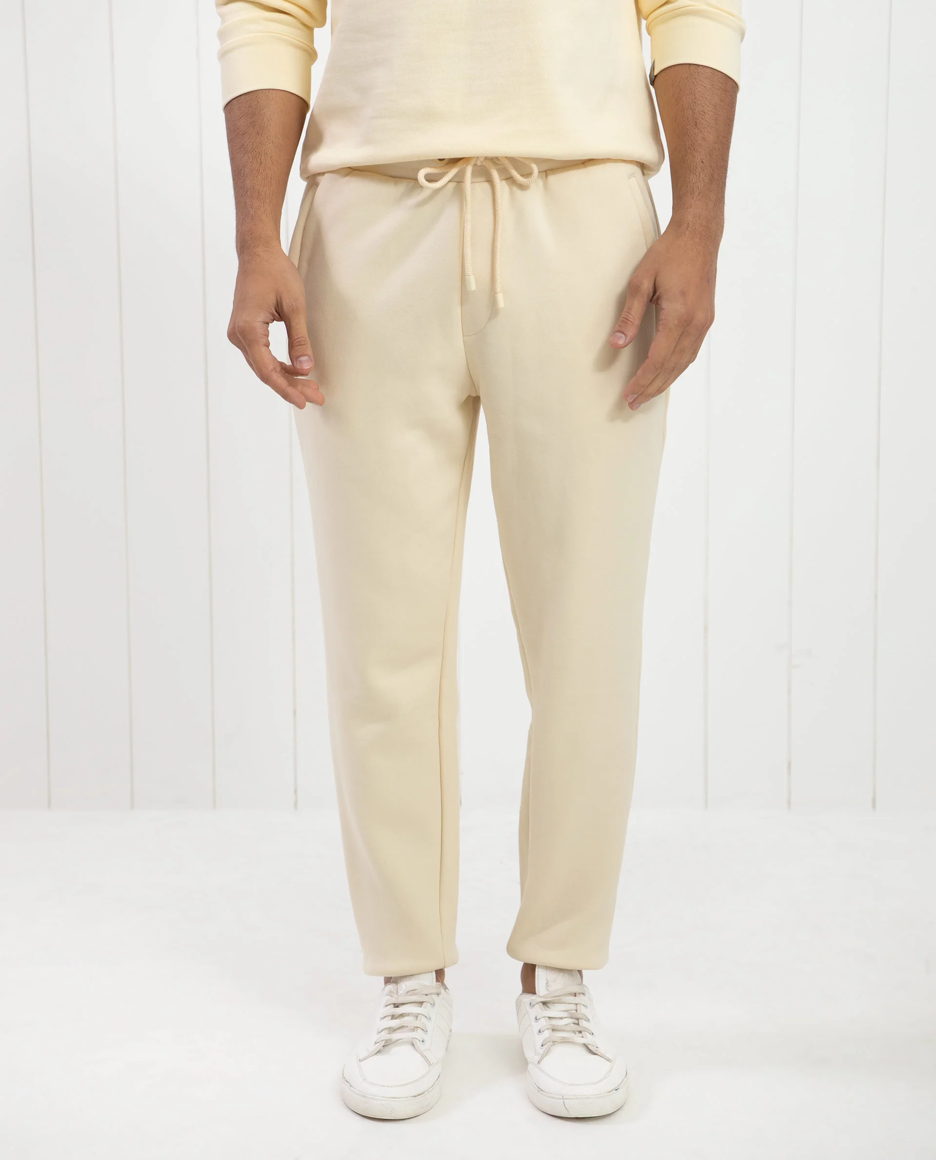 Rare Rabbit Men's Bard Light Yellow Cotton Plain Regular Fit Track Pant