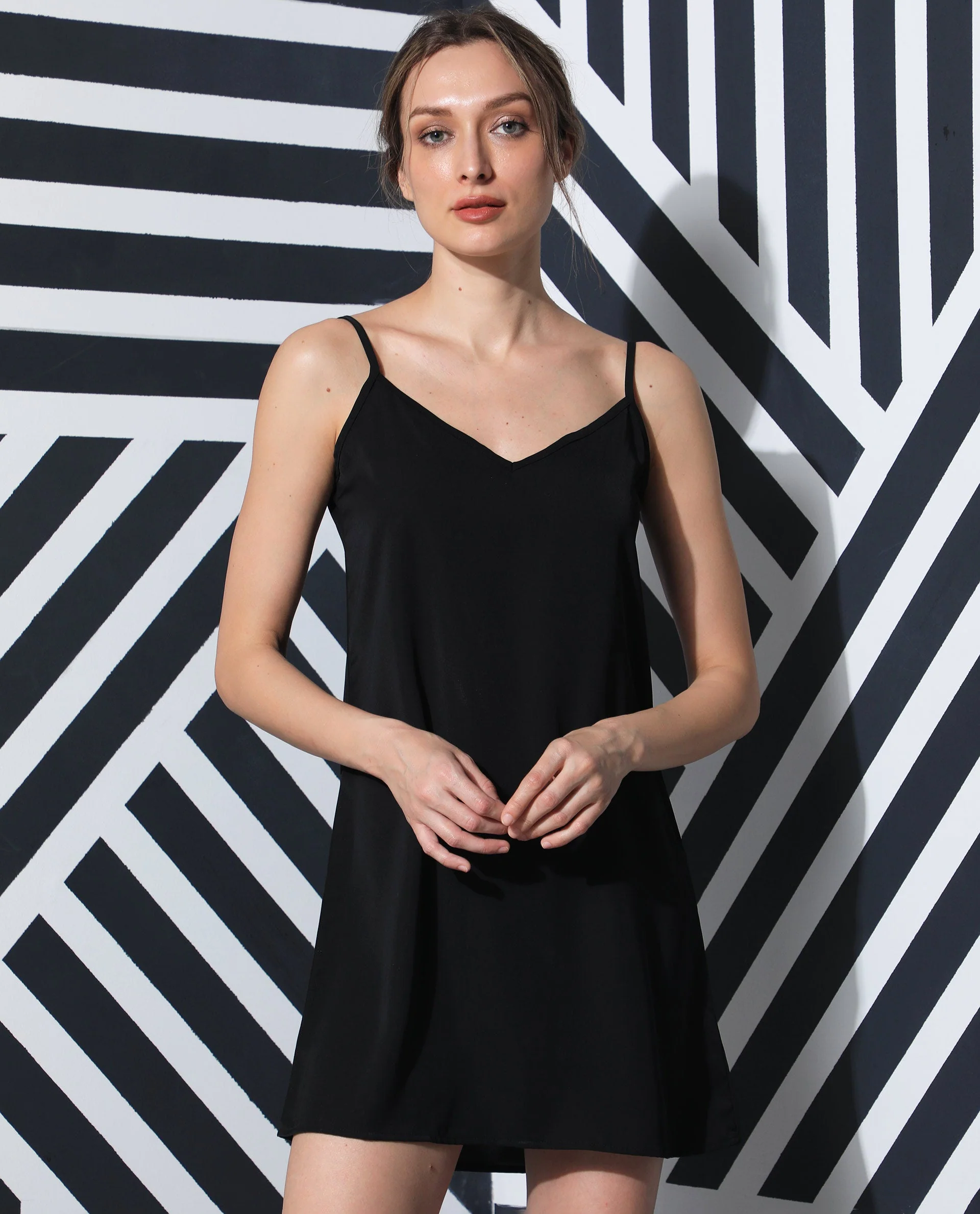 Rareism Women's Slipos Black Polyester V-Neck Plain Shoulder Strap Knee Length Regular Fit Inner Wear