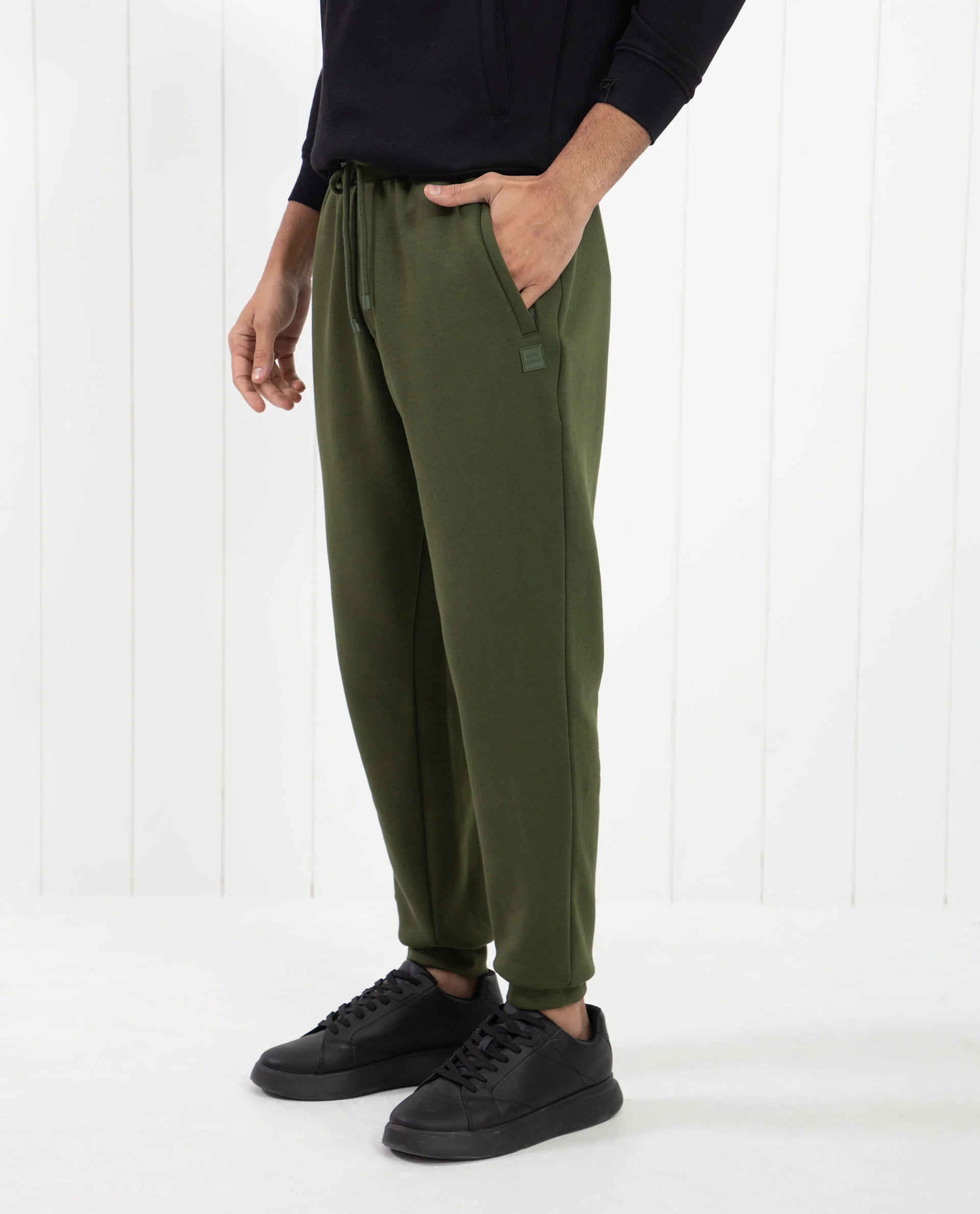 Rare Rabbit Men's Tyrone Olive Cotton Plain Regular Fit Joggers - Image 5